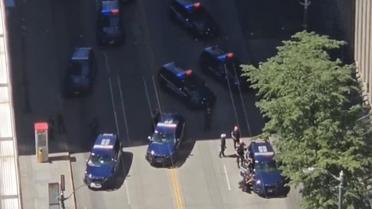 alert-–-police-swarm-fbi-headquarters-in-seattle-as-woman-with-a-gun-storms-building