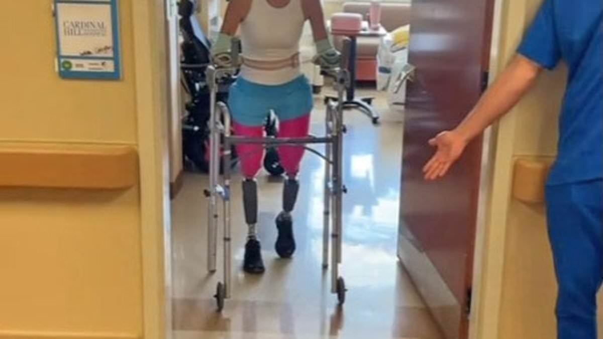 alert-–-lucinda-mullins,-41,-takes-her-first-steps-using-prosthetics-after-losing-all-her-limbs-to-sepsis