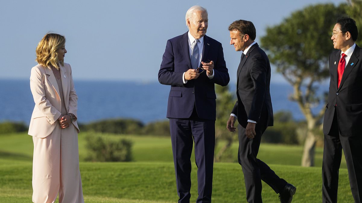 alert-–-moment-italy’s-giorgia-meloni-has-to-grab-biden,-81,-after-he-wandered-away-from-parachute-display-photo-op:-follow-all-politics-stories-of-the-day