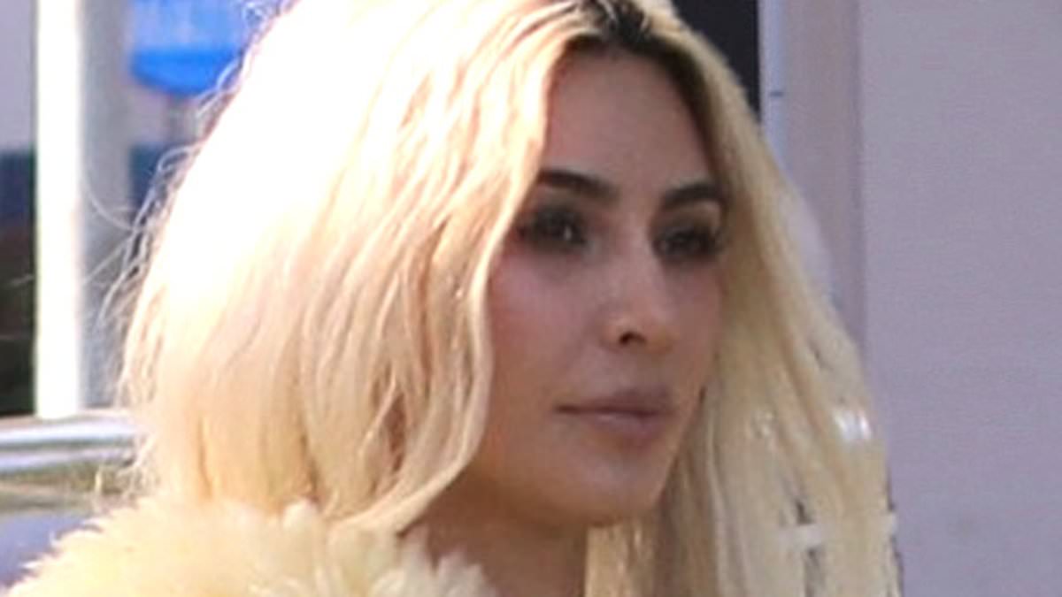 alert-–-kim-kardashian-flaunts-her-famous-curves-in-a-grey-tracksuit-co-ord-and-fluffy-maxi-bag-as-she-grabs-a-smoothie-in-calabasas