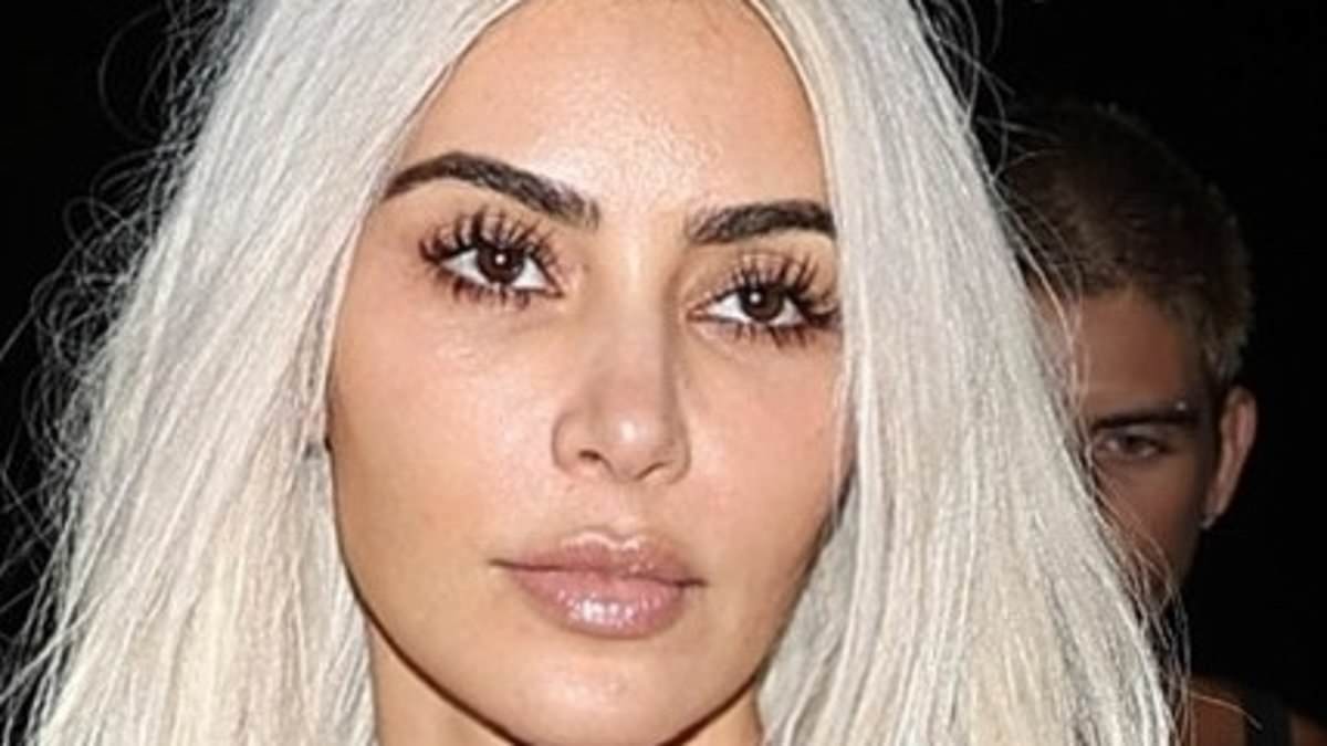 alert-–-kim-kardashian-shows-off-her-eye-popping-curves-in-a-racy-illusion-dress-and-bizarre-nude-leggings-after-ex-kanye-west’s-wife-bianca-censori-copied-her-iconic-‘boob-tape’-look