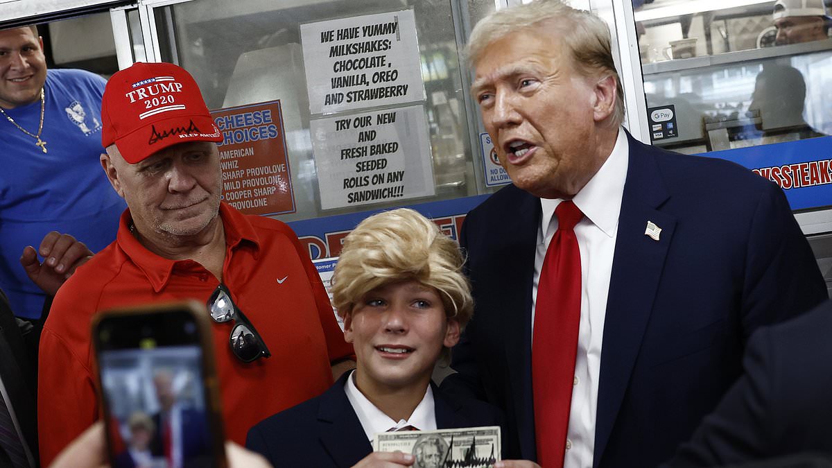 alert-–-young-trump-superfan-in-suit-and-yellow-wig-bursts-into-tears-as-he-meets-his-idol-at-philadelphia-rally,-as-gop-vp-pick-is-decided