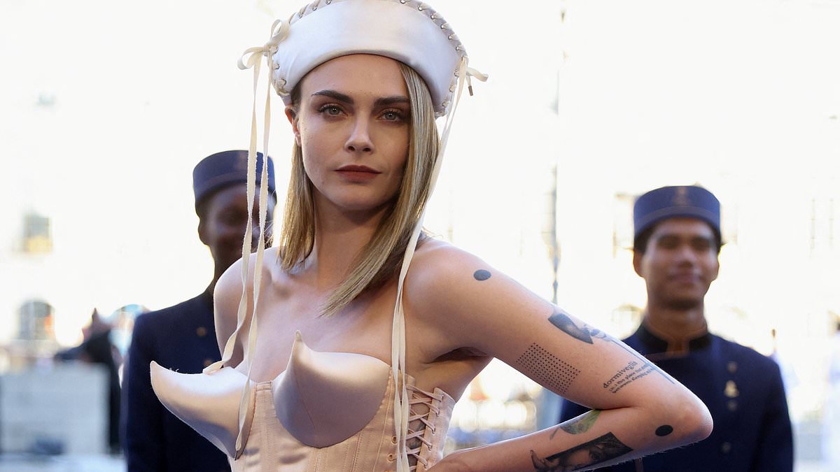 alert-–-cara-delevingne-poses-up-a-storm-in-madonna’s-iconic-jean-paul-gaultier-cone-bra-as-she-steals-the-show-at-vogue-world-paris