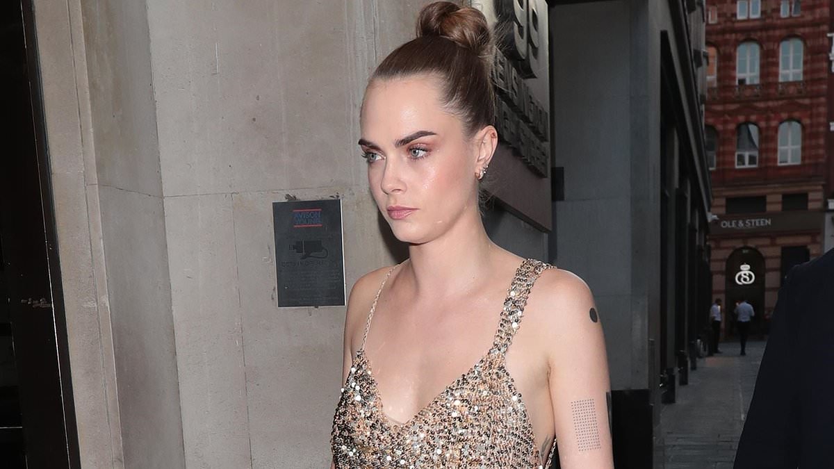 alert-–-cara-delevingne-puts-on-a-leggy-display-in-a-glitzy-gold-mini-dress-while-her-sister-poppy-wows-in-a-white-cut-out-jumpsuit-as-they-arrive-at-their-della-vite-zero-launch-party