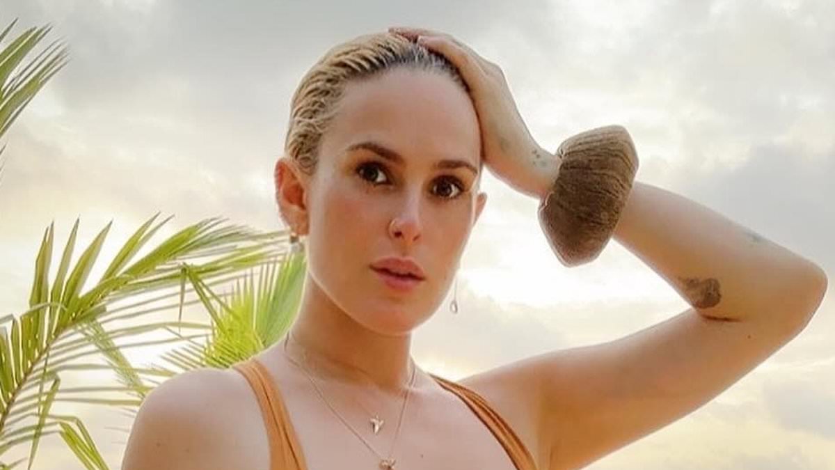 alert-–-rumer-willis-looks-slender-in-a-bikini-top-and-matching-skirt-as-she-enjoys-a-vacation-in-the-caymans-with-daughter-louetta,-one