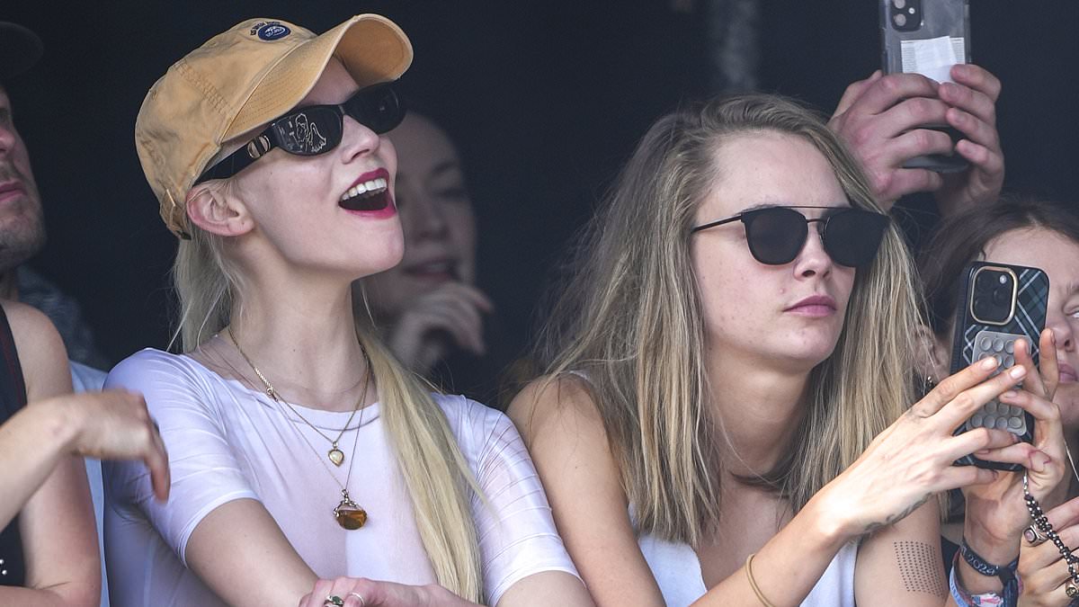 alert-–-anya-taylor-joy-sports-a-wet-t-shirt-as-she-sings-her-heart-out-next-to-cara-delevingne-while-ab-flashing-mia-regan-joins-ellie-goulding-at-star-studded-glastonbury-festival-ahead-of-coldplay’s-headline-performance