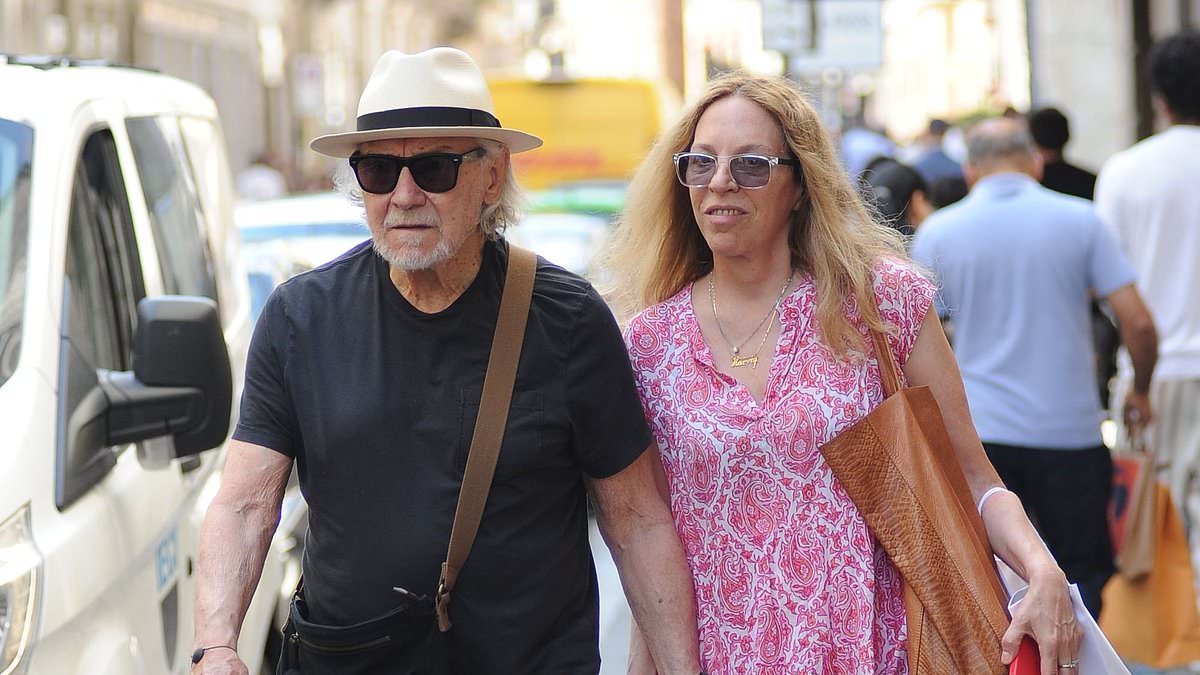 alert-–-harvey-keitel,-85,-and-wife-daphna-kastner,-63,-spotted-on-rare-outing-as-they-hold-hands-and-stroll-through-the-streets-of-milan-during-romantic-getaway
