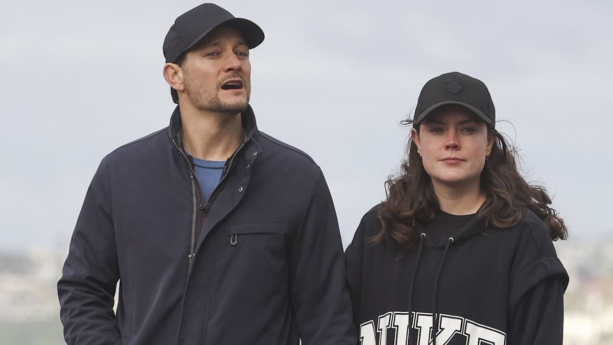 alert-–-the-project’s-georgie-tunny-and-fiance-robert-mills-enjoy-a-rare-outing-together-as-they-hold-hands-during-morning-walk-in-sydney