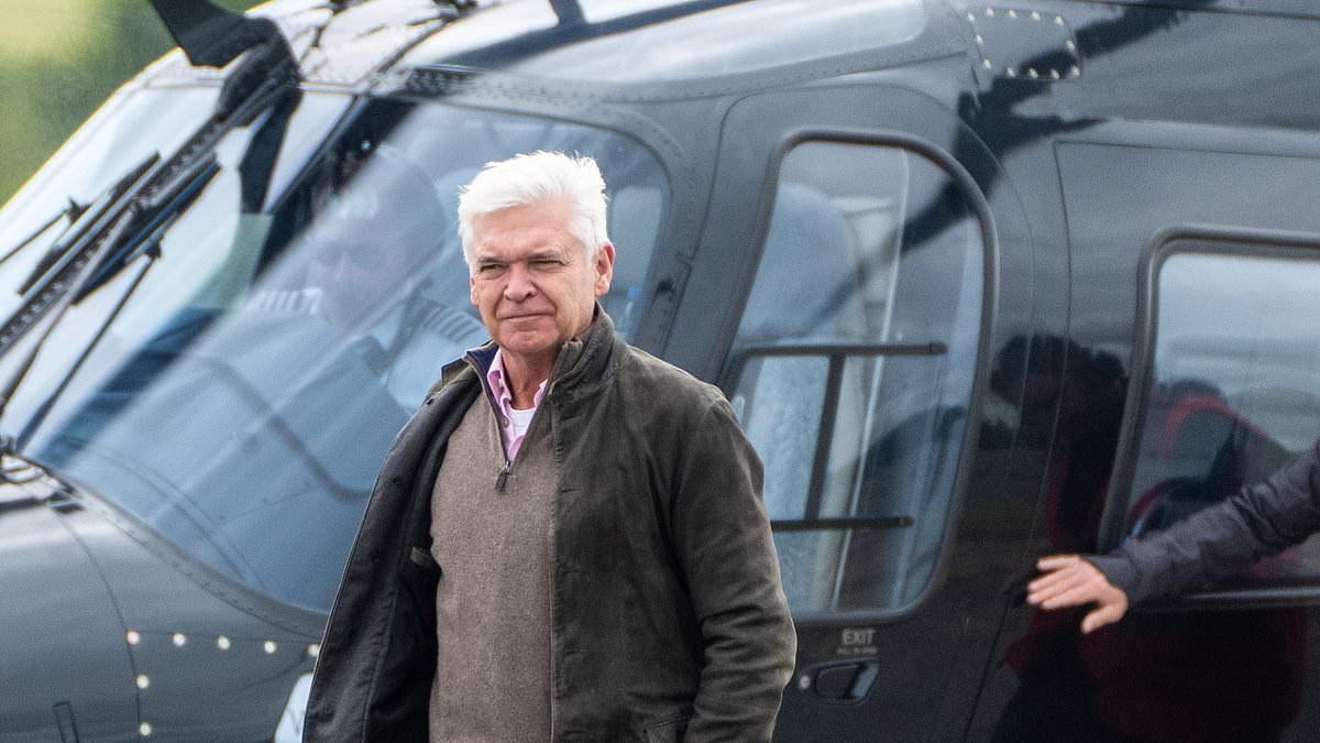 alert-–-former-this-morning-presenter-philip-schofield-arrives-by-helicopter-ahead-of-the-grand-prix-at-silverstone