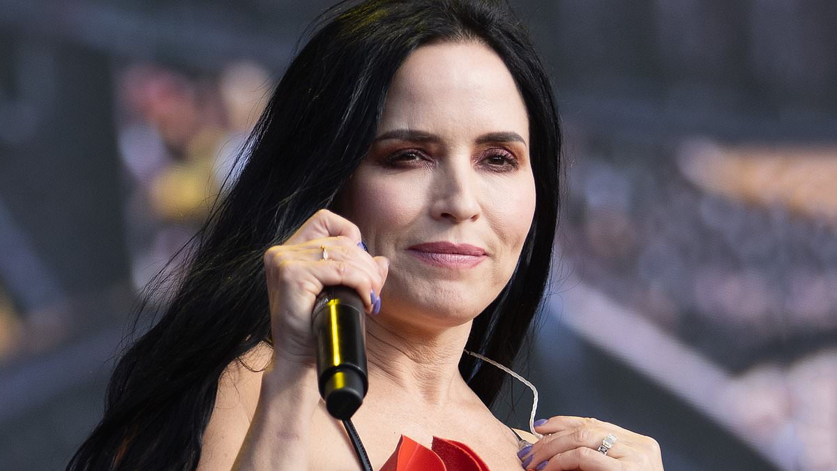 alert-–-the-corrs-thrill-festival-goers-as-they-take-to-the-stage-at-bst-hyde-park-–-as-age-defying-lead-singer-andrea,-50,-stuns-in-a-racy-lbd