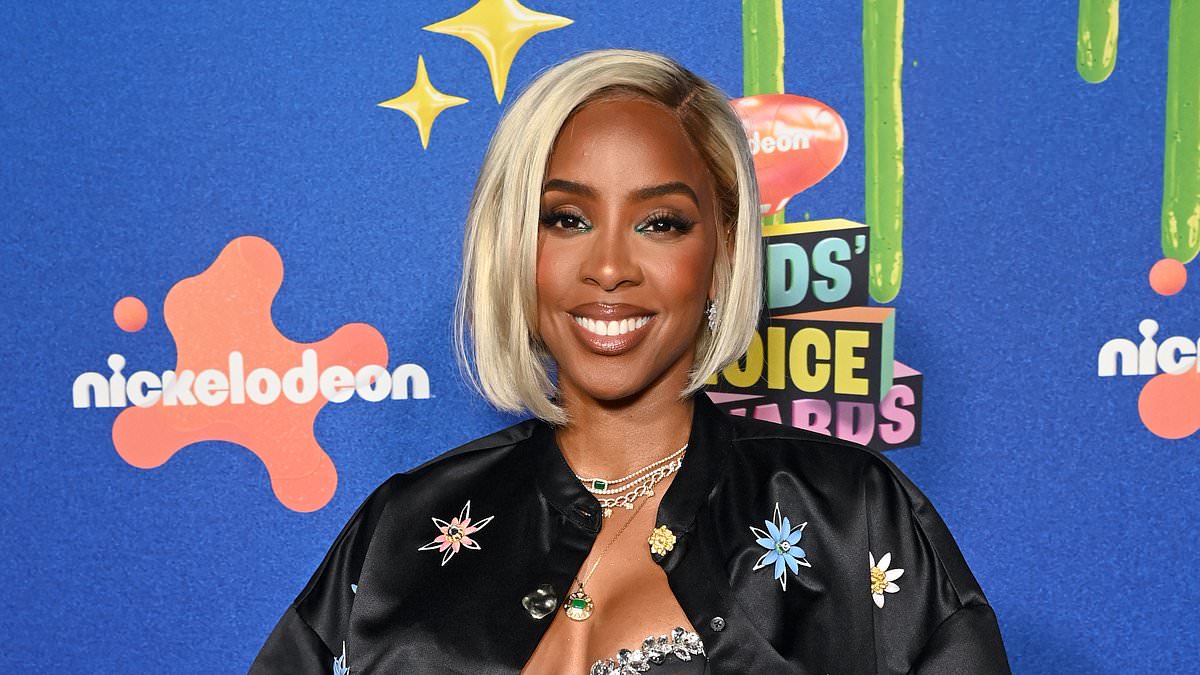 alert-–-kelly-rowland-rocks-busty-midriff-baring-top-and-shorts-as-she-attends-the-2024-kids’-choice-awards-in-la