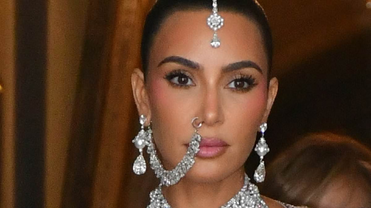 alert-–-kim-kardashian-puts-on-showstopping-display-in-a-traditional-silver-lehenga-skirt-while-her-sister-khloe-stuns-in-pink-as-they-attend-second-day-of-indian-billionaire’s-son’s-anant-ambani’s-250m-wedding