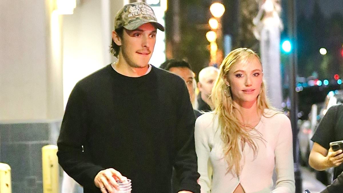 alert-–-longlegs-star-maika-monroe-stuns-in-a-cardigan-and-mini-skirt-while-looking-loved-up-with-boyfriend-dalton-gomez-–-who-is-ariana-grande’s-ex-–-after-screening-and-q&a-for-the-horror-film-in-la