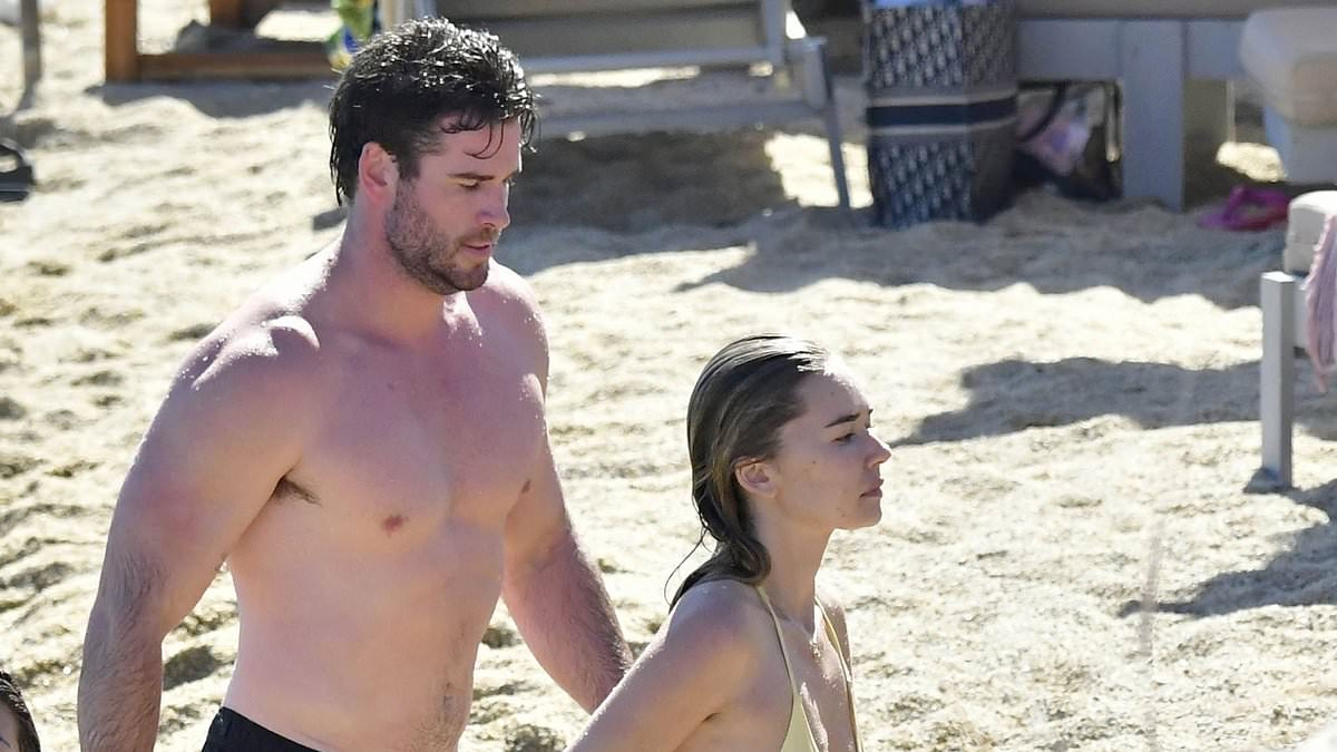 alert-–-liam-hemsworth-and-stunning-model-girlfriend-gabriella-brooks-show-off-their-impressive-beach-bodies-during-european-holiday-in-mykonos