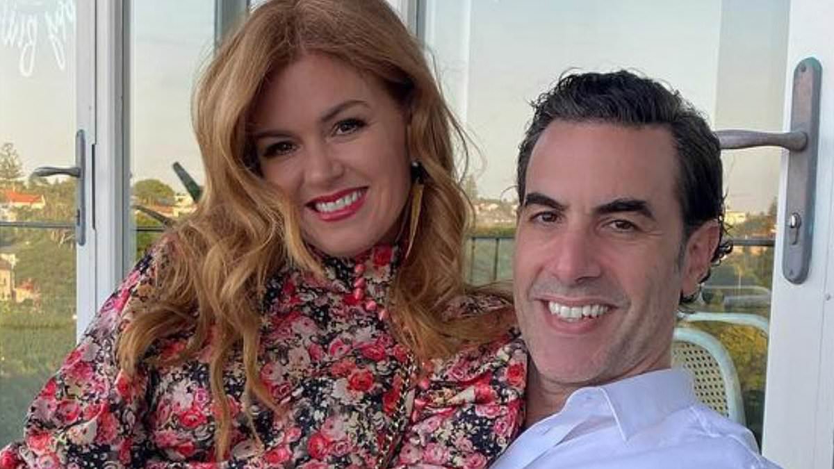 alert-–-isla-fisher-posts-a-picture-of-herself-with-a-mystery-companion-placing-their-hand-on-her-bottom-after-split-with-sacha-baron-cohen