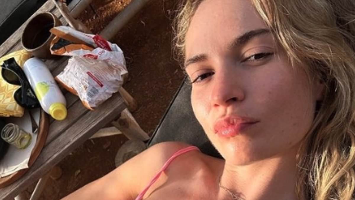 alert-–-lily-james-flaunts-her-incredible-figure-in-a-high-cut-pink-swimsuit-as-tops-up-her-tan-in-sun-soaked-snap