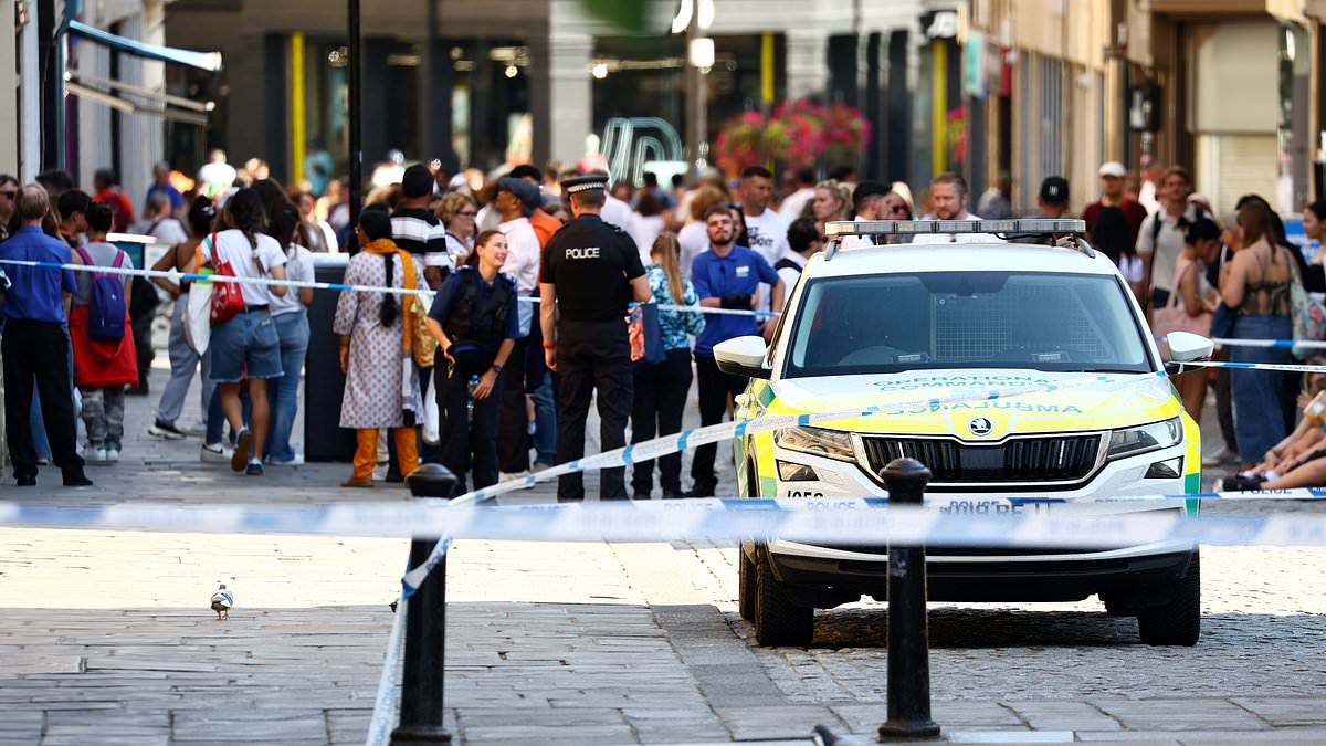 alert-–-bath-emergency-incident:-two-people-are-taken-to-hospital-after-a-woman-‘approached-them-with-a-bag’-as-police-crews-in-hazmat-suits-lock-down-city-centre-after-shoppers-were-left-with-breathing-difficulties-and-itchy-eyes