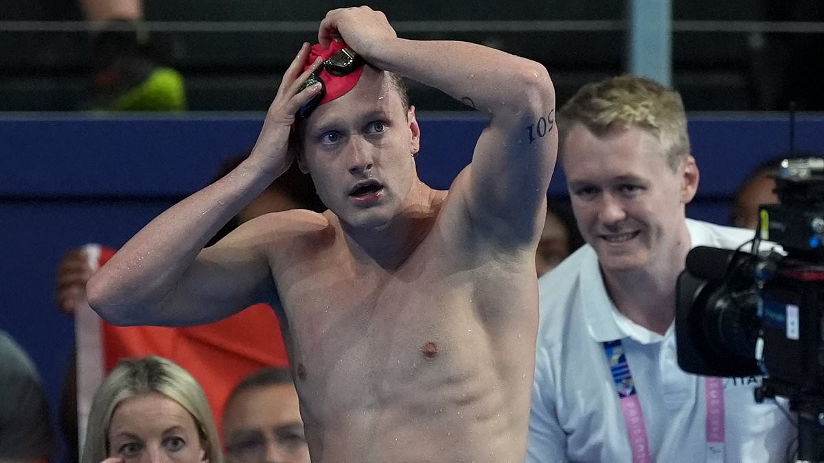 alert-–-team-gb-swimmer-drops-to-the-floor-in-despair-as-he-is-thrown-out-of-the-olympics-despite-finishing-in-first-after-he-broke-little-known-rule-in-200m-backstroke-heats