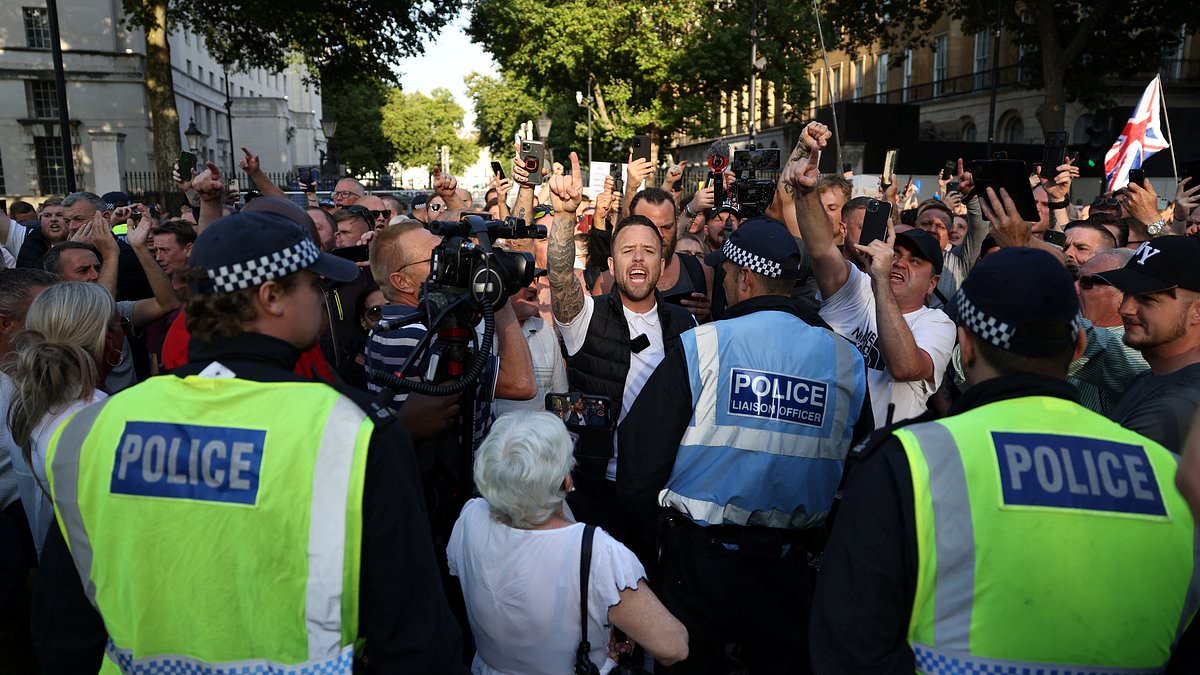 alert-–-thugs-throw-bottles-at-police-and-launch-flares-onto-winston-churchill-statue-in-second-night-of-violence-over-death-of-three-girls-in-southport-after-ugly-riots-outside-mosque-left-dozens-of-officers-injured