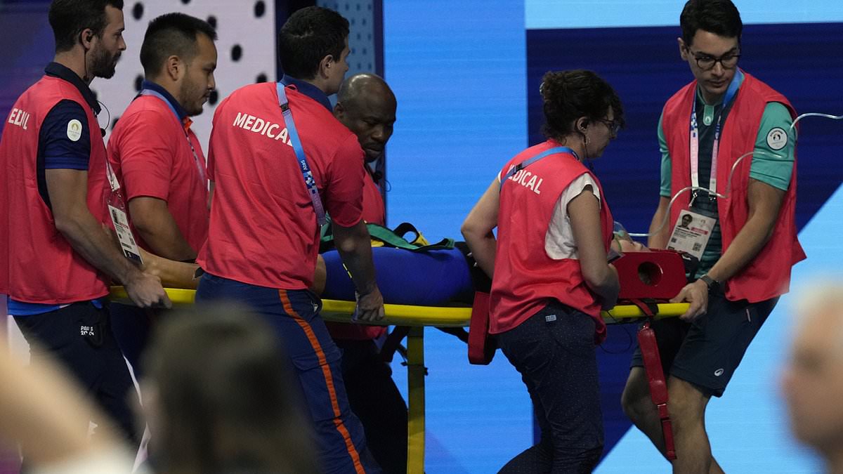 alert-–-slovakian-swimmer-tamara-potocka,-21,-collapses-and-is-taken-away-on-a-stretcher-in-front-of-horrified-spectators-and-her-brit-rival-after-finishing-seventh-in-olympic-200m-individual-medley-heat