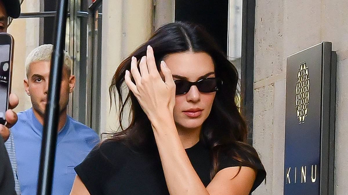 alert-–-kendall-jenner-nails-casual-chic-in-midriff-baring-top-and-gold-skirt-as-she-enjoys-outing-in-paris