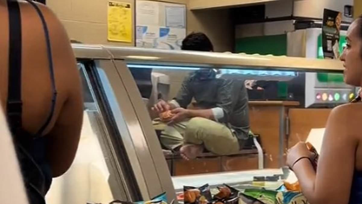 alert-–-stomach-churning-moment-chicago-subway-worker-sits-on-food-prep-counter-with-his-filthy-bare-feet-and-makes-himself-a-sandwich