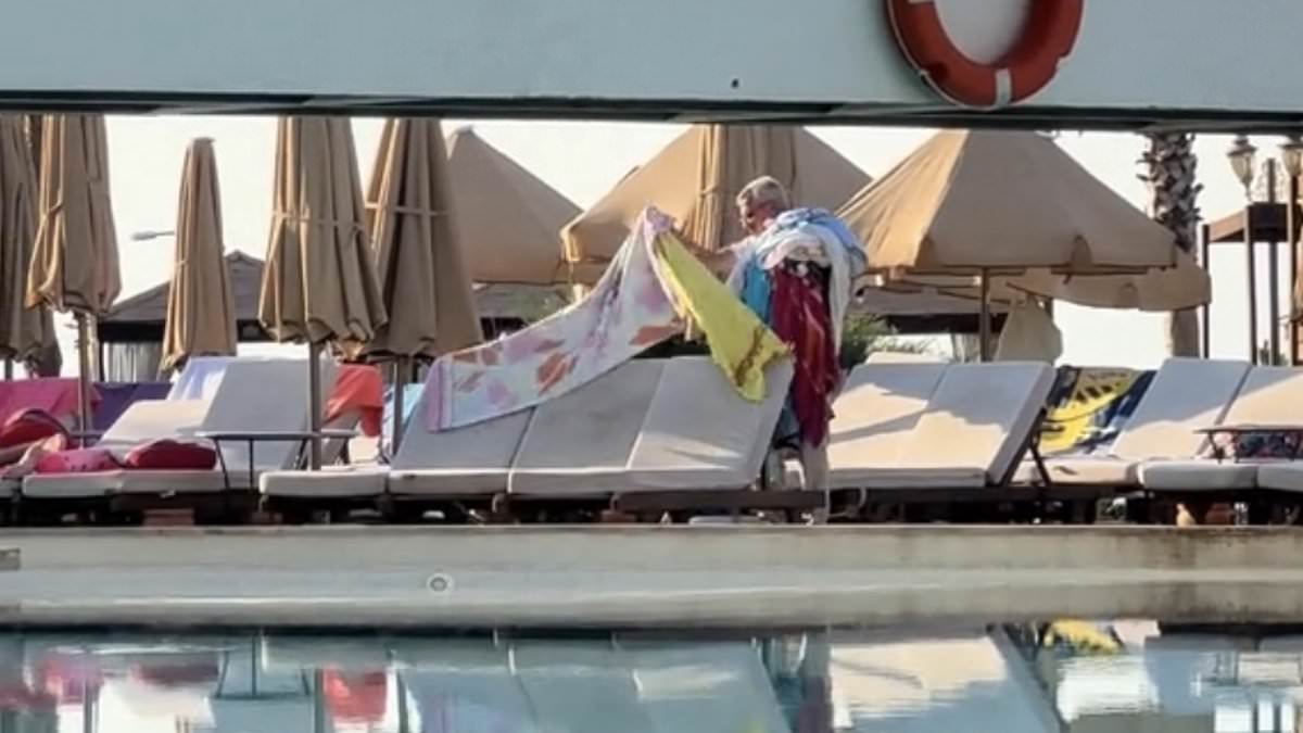 alert-–-instant-karma-for-selfish-sunbed-hoggers!-turkish-hotel-staff-remove-towels-from-‘reserved’-loungers-so-everyone-gets-a-chance-to-sit-by-the-pool