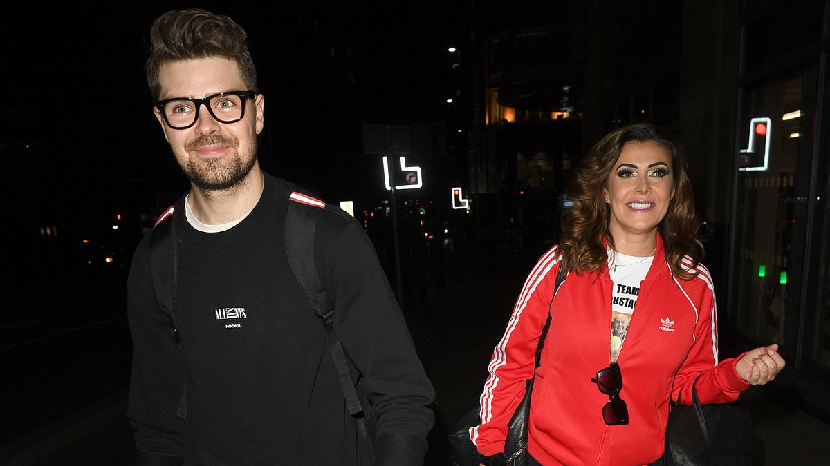 alert-–-kym-marsh,-48,-and-her-toyboy-boyfriend-samuel-thomas,-29,-depart-the-theatre-with-her-daughter-polly after-starring-in-101-dalmatians