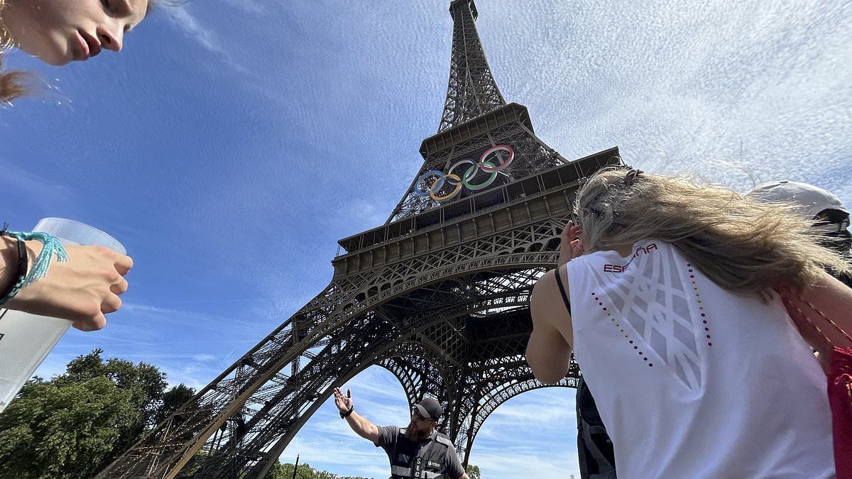 alert-–-eiffel-tower-is-evacuated-after-man-seen-climbing-iconic-paris-landmark-just-hours-before-olympics-closing-ceremony