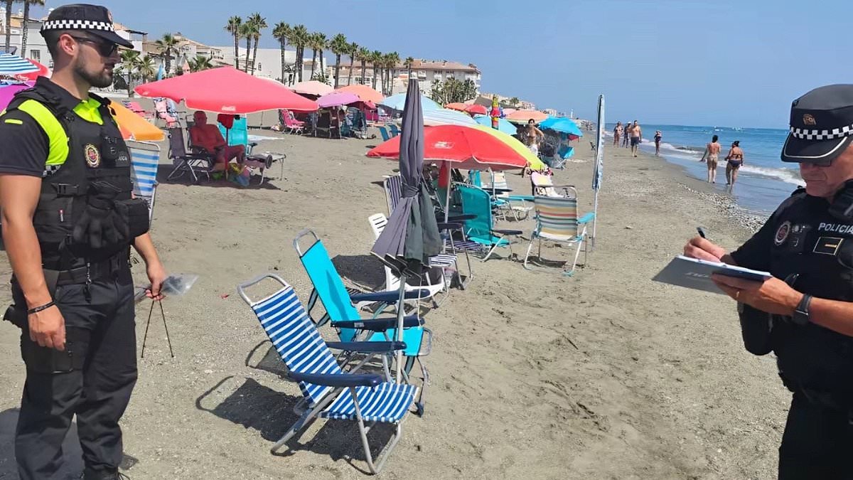 alert-–-spanish-police-join-war-on-tourists:-cops-in-canary-and-balearic-islands-confiscate-loungers-and-umbrellas-of-selfish-tourists-who-have-set-up-before-dawn-–-and-charge-them-210-to-retrieve-them