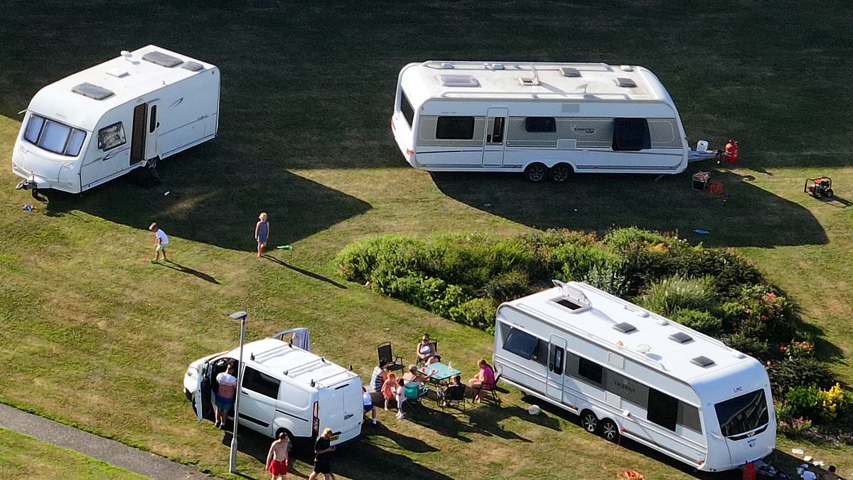 alert-–-you-can’t-park-there!-families-living-on-private-estate-call-in-the-police-after-travellers-move-onto-their-green-with-their-caravans