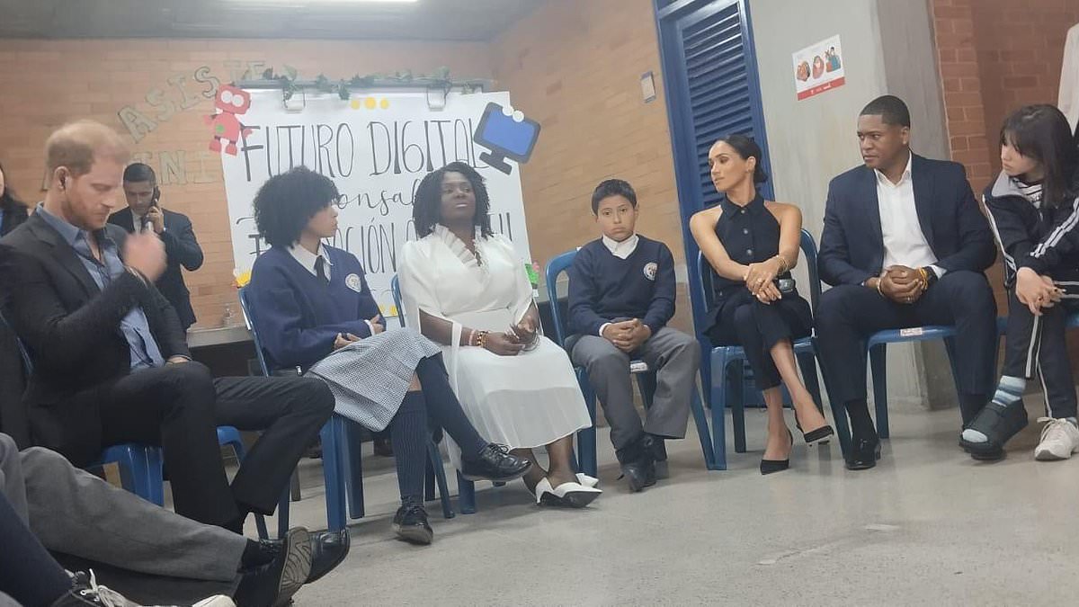 alert-–-beaming-harry-and-meghan-enjoy-a-show-by-colombian-folk-dancers-after-meeting-bored-looking-schoolchildren-in-bogota-at-the-start-of-the-duke-and-duchess’-four-day-visit