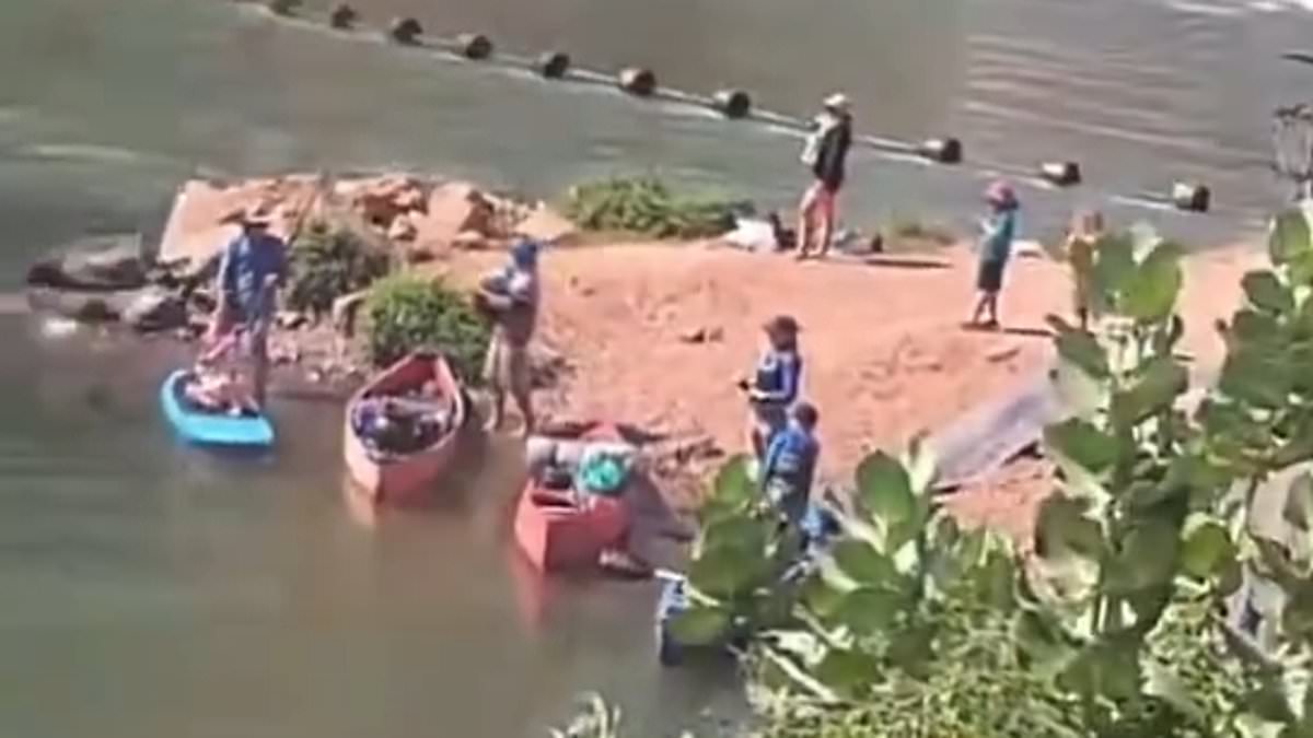 alert-–-lake-argyle-dam:-terrifying-detail-in-footage-of-a-family-canoeing-in-a-picturesque-river