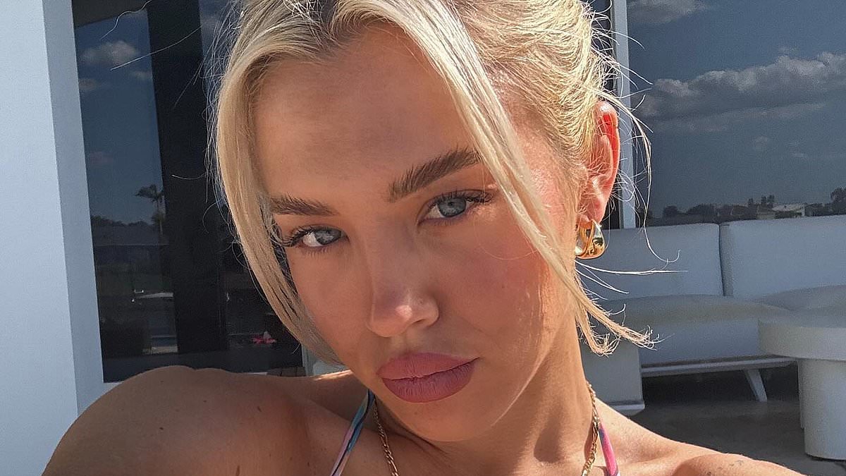 alert-–-tammy-hembrow-flaunts-her-very-ample-assets-after-admitting-to-having-breast-implants-fixed