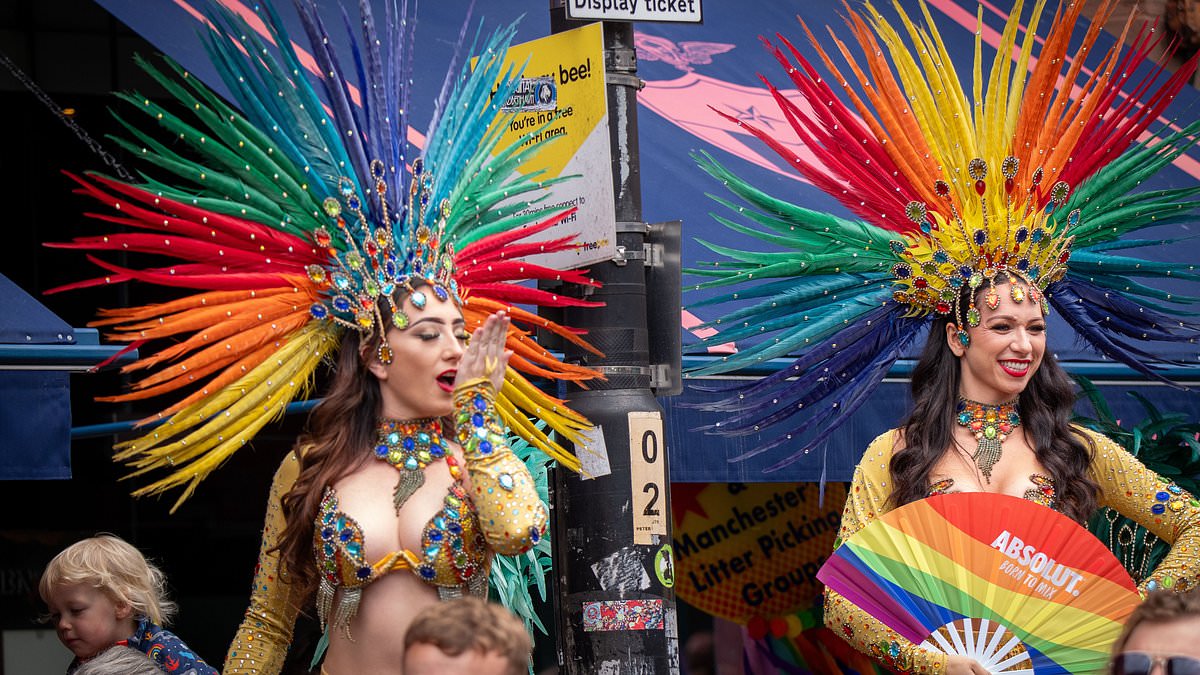 alert-–-thousands-join-the-fun-at-manchester’s-pride-parade-as-gaza-protesters’-bid-to-block-the-route-with-a-staged-‘die-in’-fails