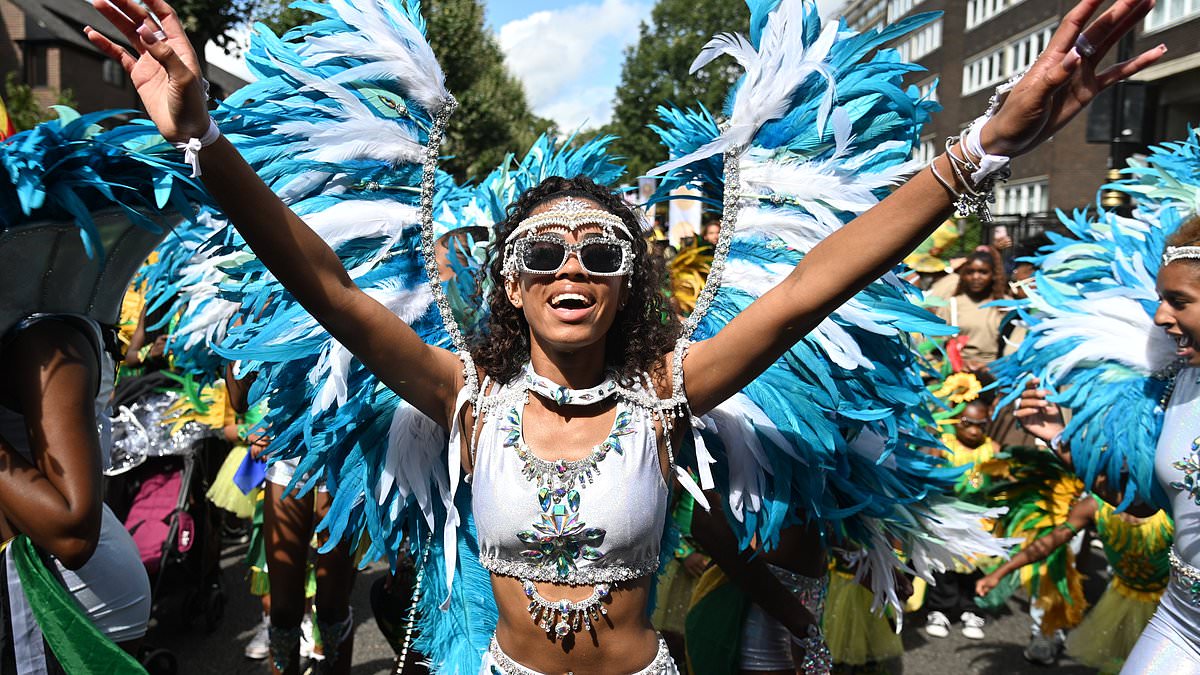 alert-–-it’s-party-time!-thousands-pack-out-streets-in-colourful-outfits-for-notting-hill-carnival’s-‘family-day’-–-but-police-brace-for-trouble-after-violence-marred-previous-celebrations