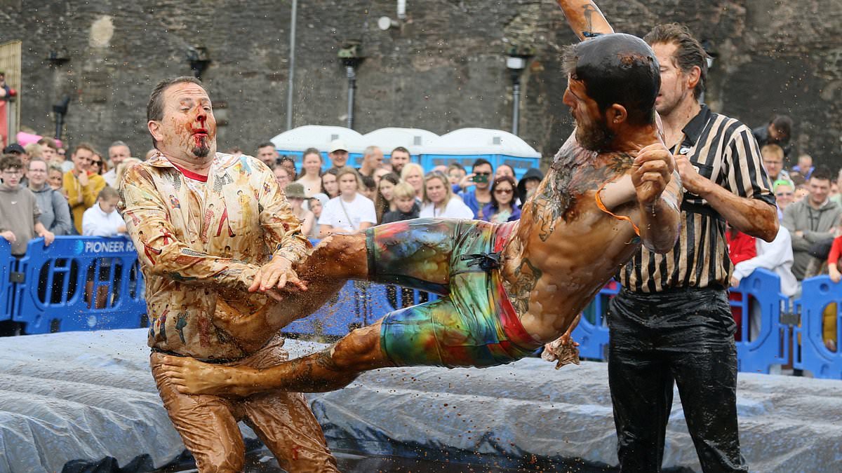 alert-–-britain’s-wacky-bank-holiday-returns:-from-snorkeling-in-bogs-and-playing-football-in-a-river,-to-the-‘world-gravy-wrestling-championships’-at-a-pub-that-leaves-at-last-one-competitor-battered