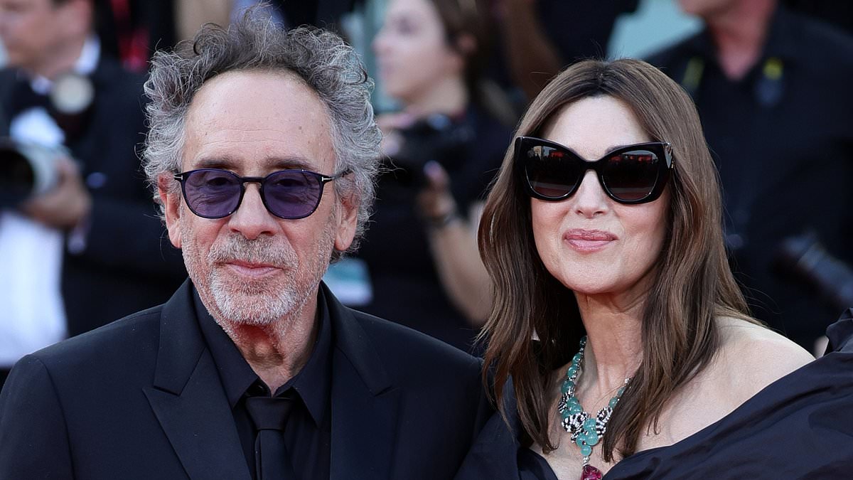 alert-–-monica-bellucci-and-director-boyfriend-tim-burton-dress-to-impress-in-matching-black-as-they-pose-on-the-red-carpet-at-the-beetlejuice-2-premiere-during-venice-film-festival