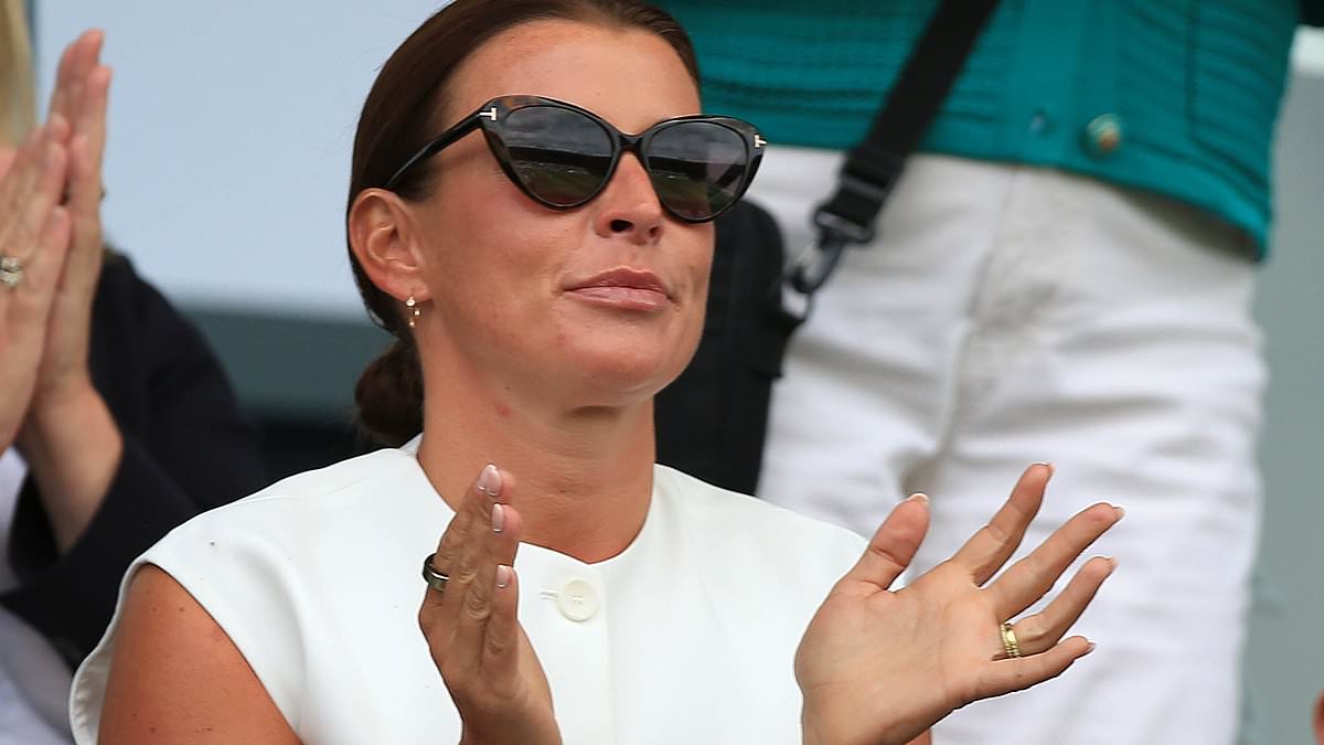 alert-–-coleen-rooney-looks-effortlessly-chic-in-a-white-top-and-oversized-shades-as-she-joins-her-sons-in-cheering-on-husband-wayne’s-football-team-plymouth-argyle-from-the-director’s-box