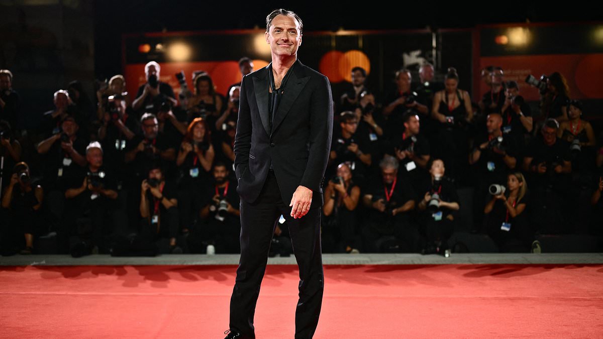 alert-–-jude-law-cuts-a-dapper-figure-in-a-black-suit-as-he-hits-the-red-carpet-for-the-order-venice-film-festival-premiere