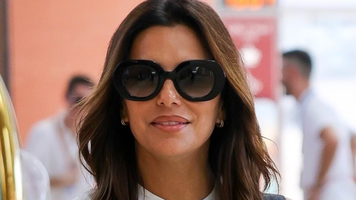 alert-–-eva-longoria-is-effortlessly-elegant-in-a-chic-floral-maxi-dress-as-she-holds-hands-with-husband-jose-baston-at-venice-airport