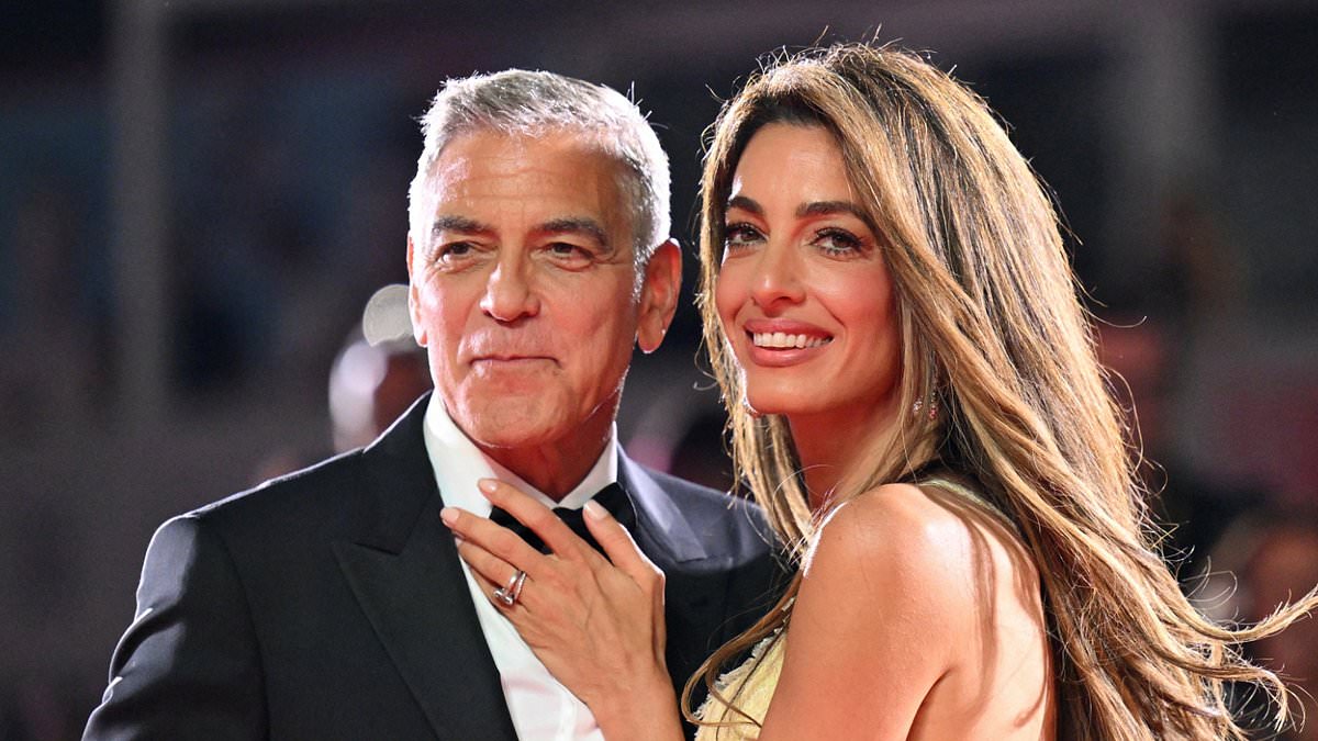 alert-–-amal-clooney-looks-incredible-in-a corsetted-gown-with-a-dramatic-ruffled-skirt-as-she-supports-husband-george-at premiere-of-wolfs-during the-81st-venice-film-festival