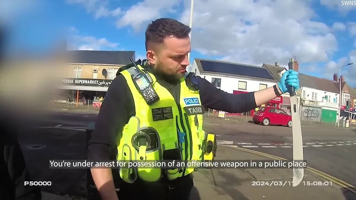 alert-–-moment-drug-dealer-stopped-by-police-demands-‘put-it-back,-man’-as-they-discover-huge-machete-hidden-inside-his-coat