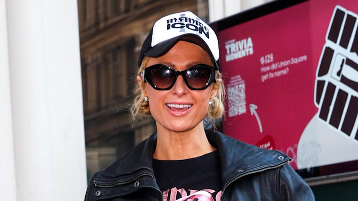 alert-–-paris-hilton-rocks-her-own-merch-and-ripped-black-leggings-as-she-promotes-her-upcoming-second-album infinite-icon-while-out-in-nyc