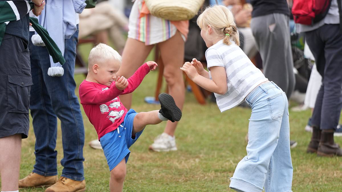 alert-–-not-another-royal-sibling-spat!-mike-tindall-leaps-into-action-to-break-up-play-fight-between-daughter-lena,-6,-and-son-lucas,-3,-as-family-cheer-on-zara-at-burghley-horse-trials