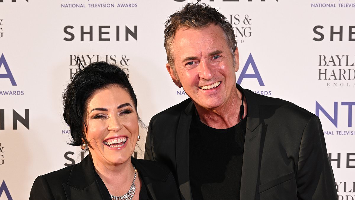 alert-–-national-television-awards-2024:-eastenders-stars-jessie-wallace-and-shane-richie-are-matching-as-they-both-don-black-suited-ensembles-for-a-joint-red-carpet-appearance