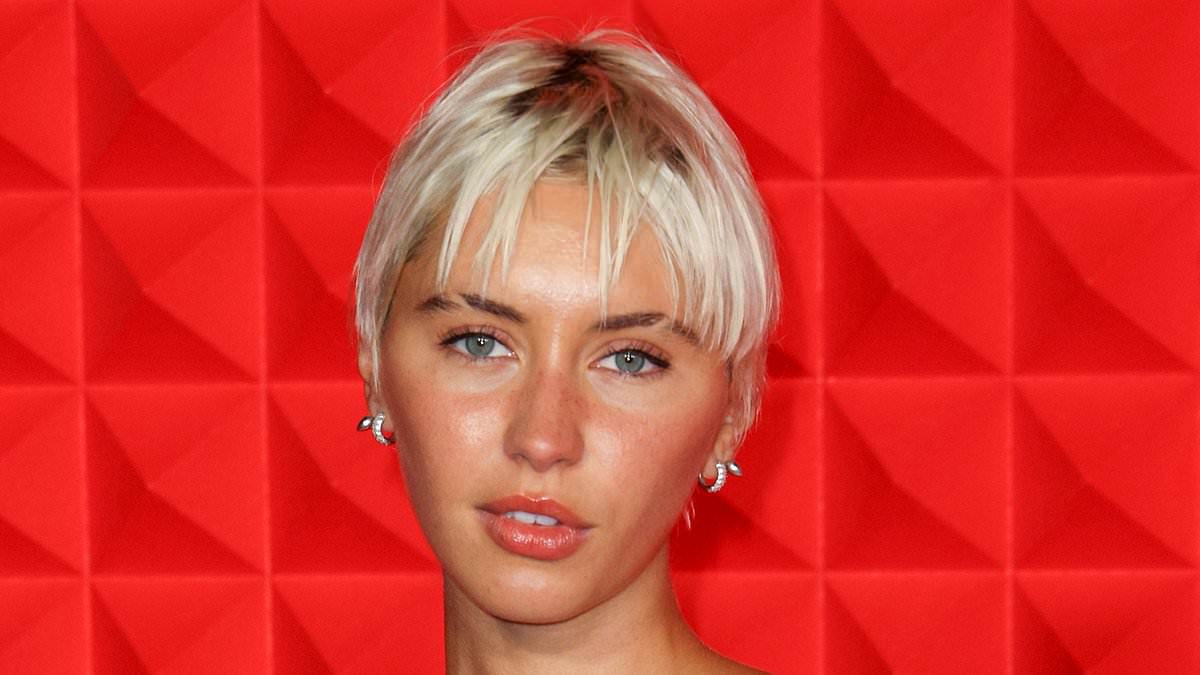 alert-–-newly-single-iris-law-stuns-in-a-strapless-mini-dress-as-attends-charli-xcx-and-h&m’s-london-fashion-week-party