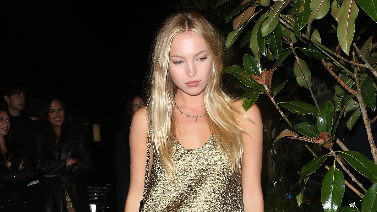 alert-–-lila-moss-puts-on-a-leggy-display-in-a-gold-shift-dress-as-she-enjoys-date-night-with-boyfriend-yoni-helbitz-at-glitzy-chiltern-firehouse-party