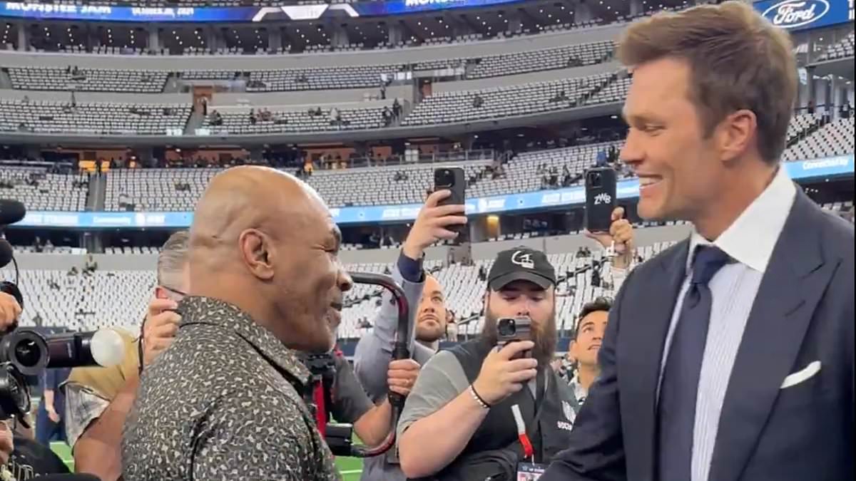 alert-–-tom-brady-hugs-mike-tyson-before-cowboys-saints-game-at-at&t-stadium…-where-the-58-year-old-boxer-will-face-jake-paul-in-two-months