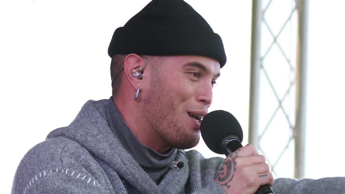 alert-–-guess-who!-big-aussie-pop-star-looks-unrecognisable-as-he-resurfaces-to-perform-during-olympic-celebration-in-new-zealand